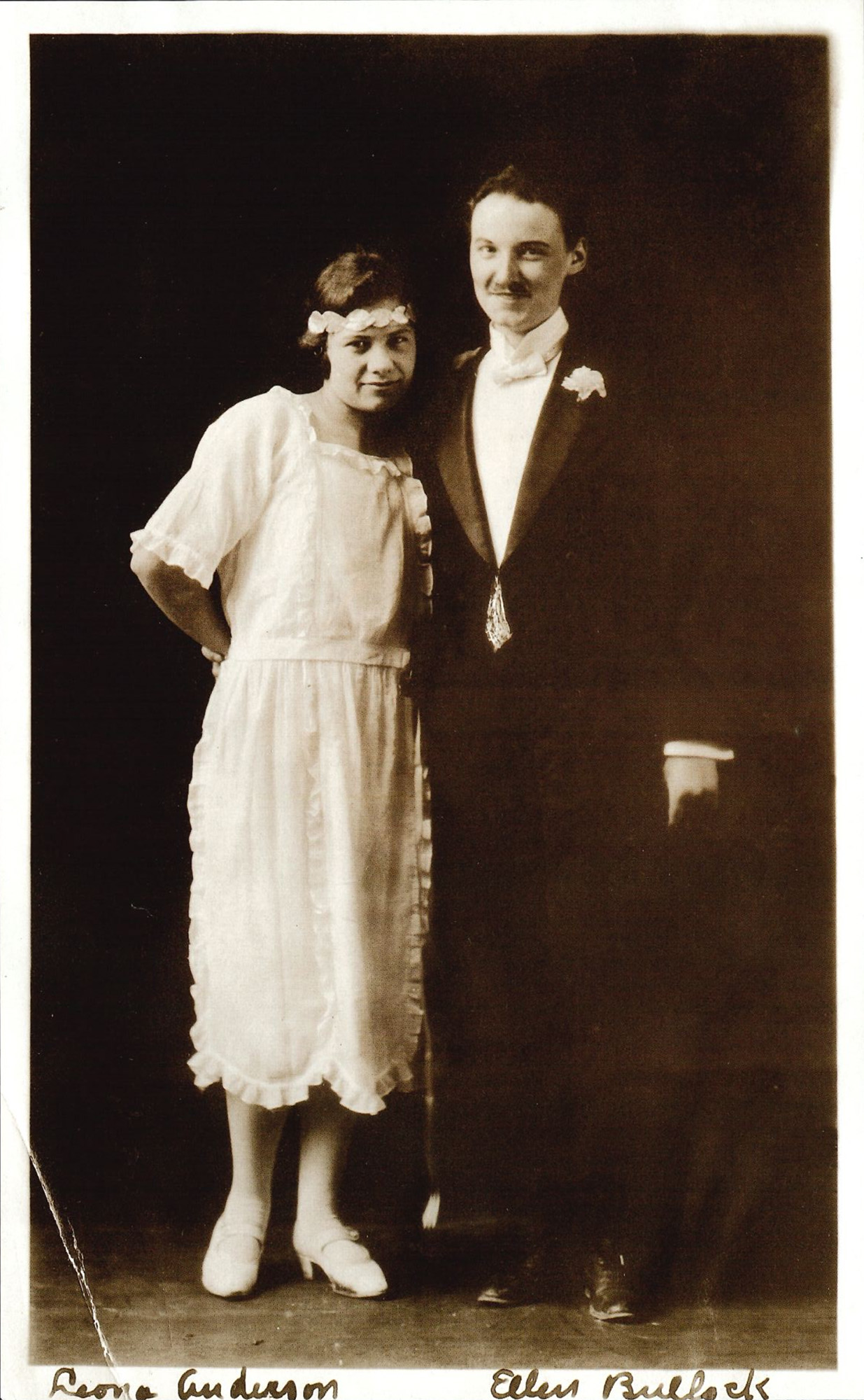 sepia photo of a couple in 1920s formalwear by Penn State Archives