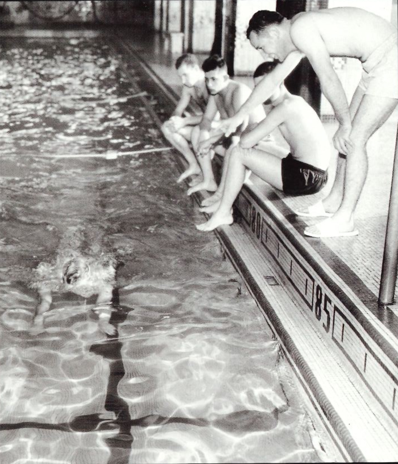 black and white photo of a student being tested in the pool by Penn State Archives