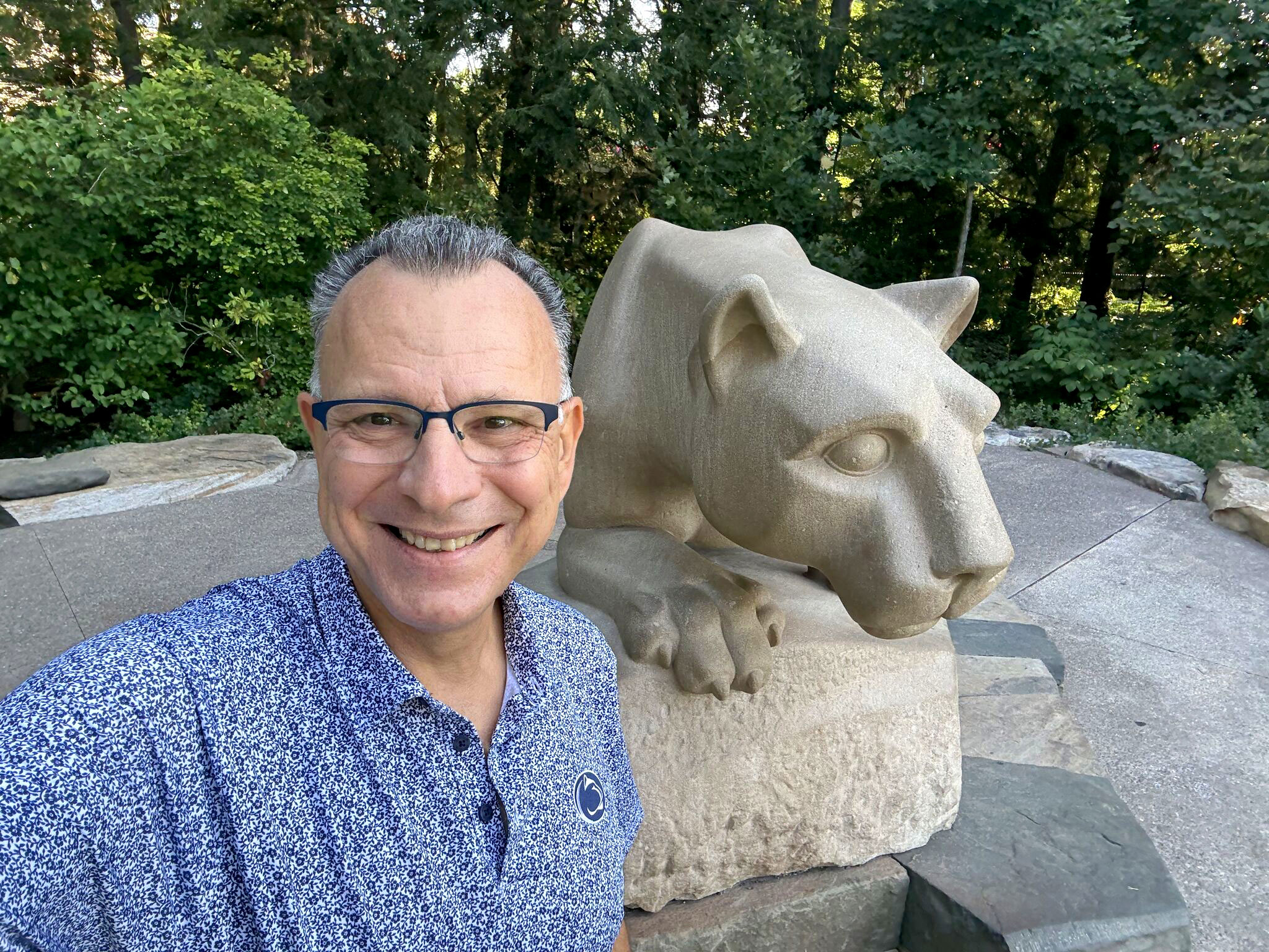 Sotiropoulos standing before the Lion Shrine, courtesy