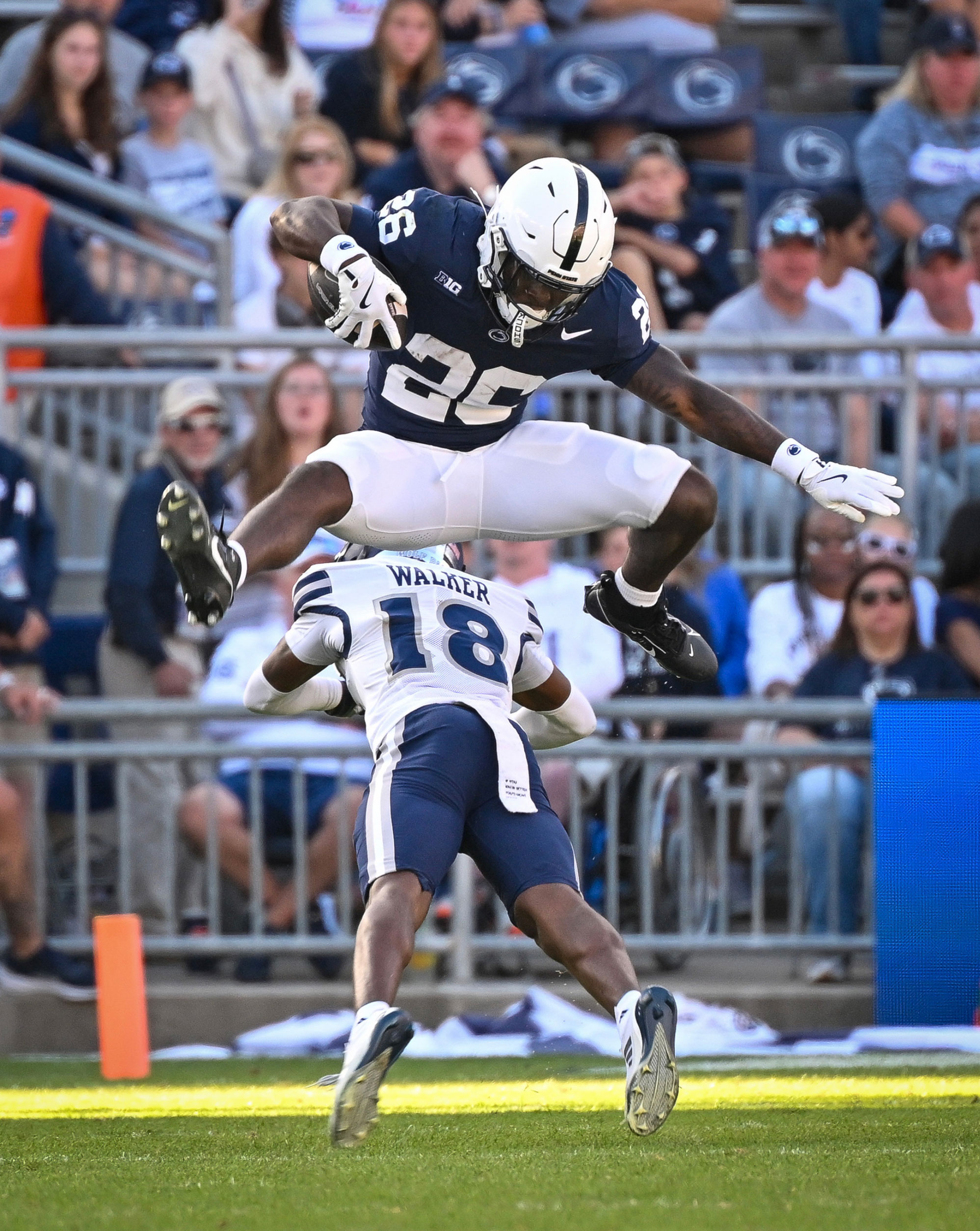 Wallace jumping over Nevada defender by Mark Selders/Penn State Athletics