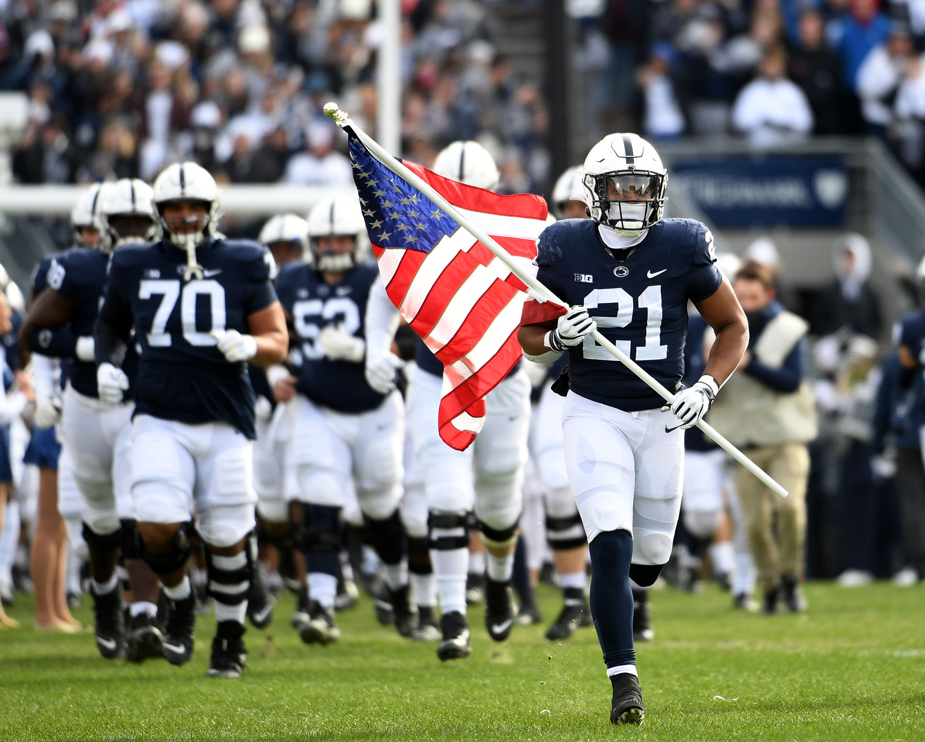 Penn State player with American flag