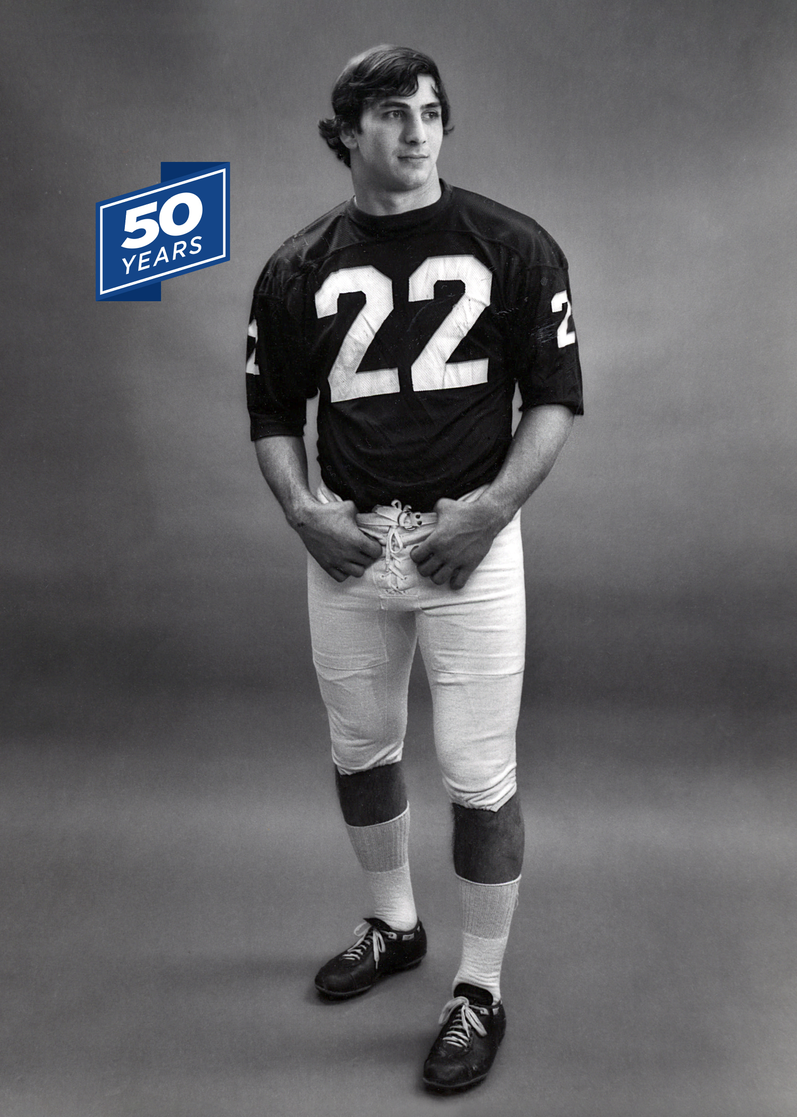 black and white of John Cappelletti in Penn State football uniform by Penn State Archives