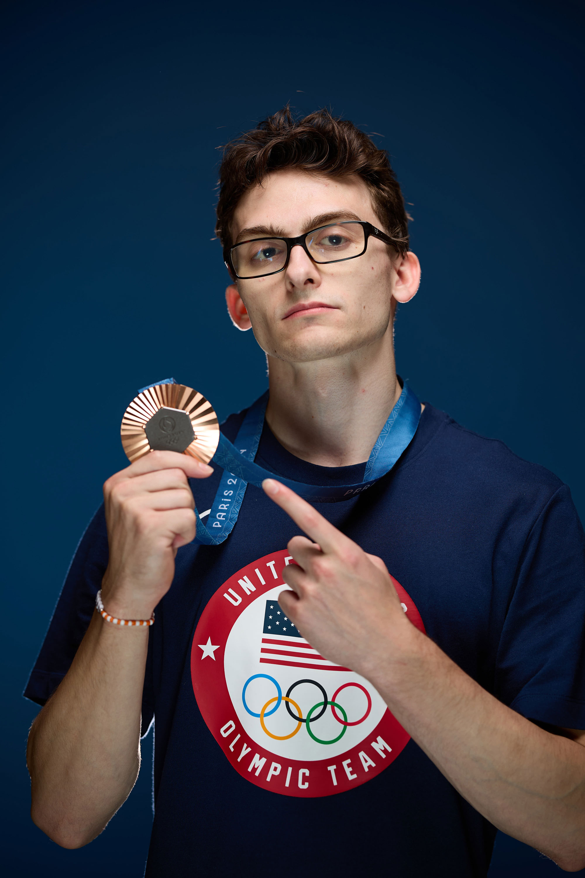 Stephen Nedoroscik holding up his bronze medal, photo by Joe Scarnici/Getty Images