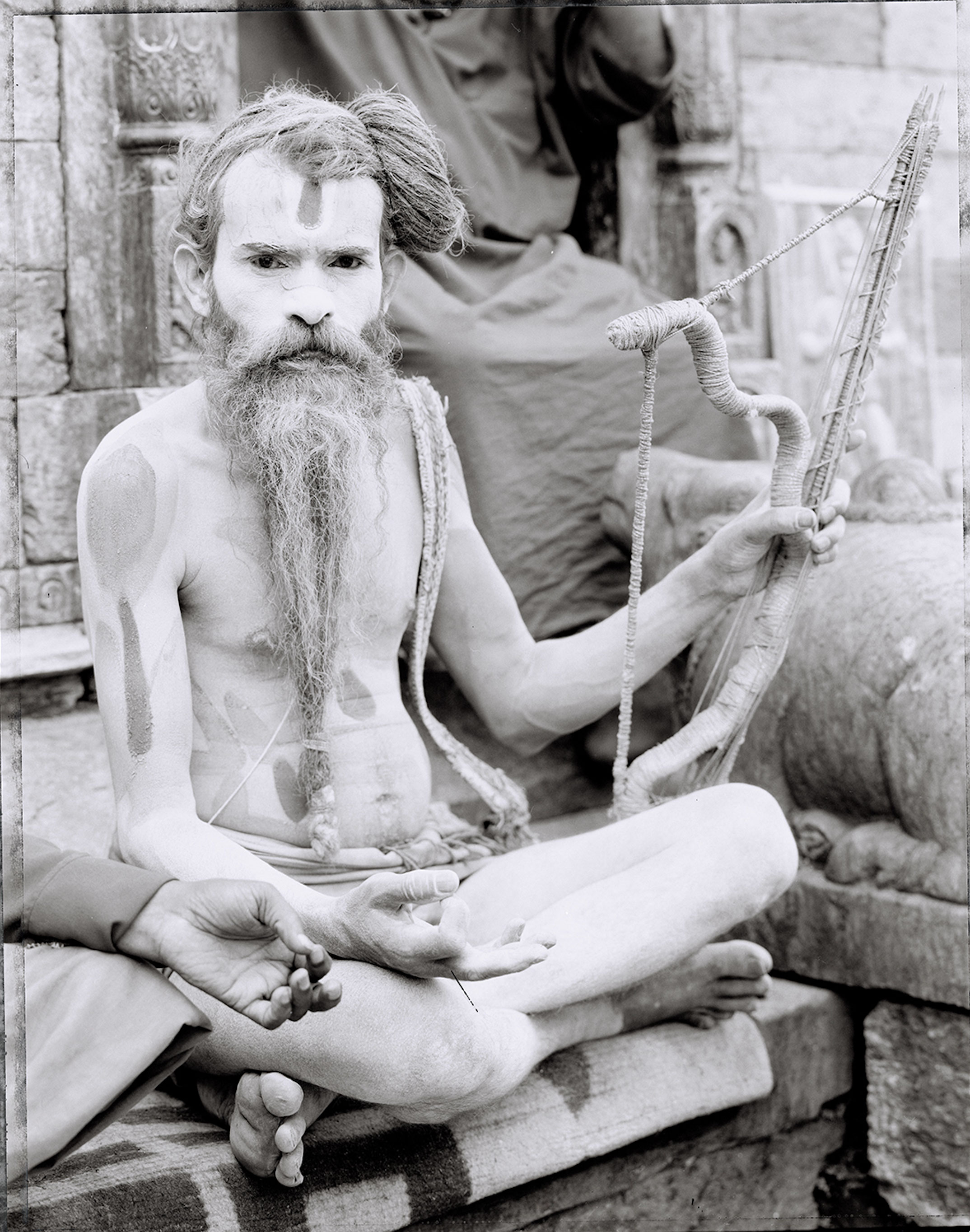 Lonnie Graham's black and white portrait of an ash-covered Hindu Sadhu outside the Pashupatinath Temple in Kathmandu Nepal