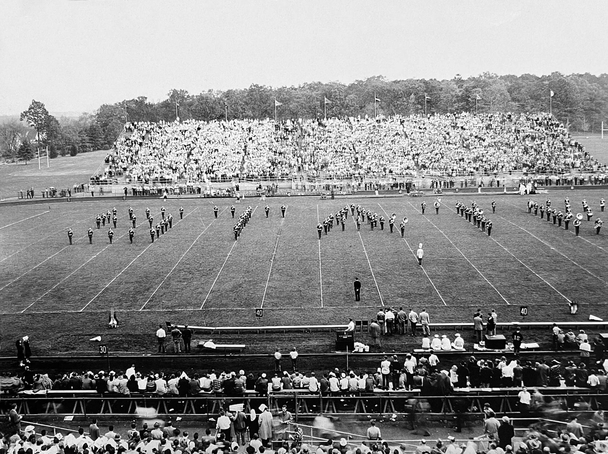 black and white photo of the Blue Band information on the field, by Penn State Archives