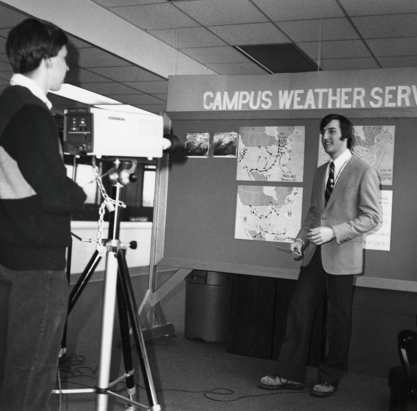 Black and white photo of alums producing Campus Weather Service, Penn State Archives