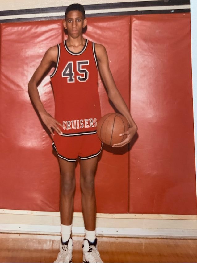 Calvin Booth in high school basketball uniform courtesy