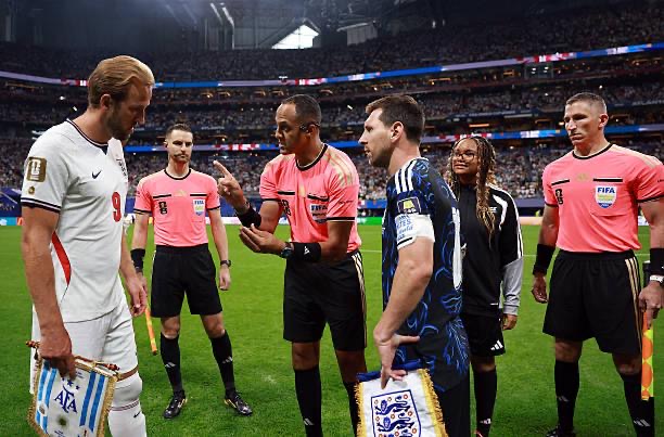 World Cup officials with Messi and Kane during coin toss, courtesy