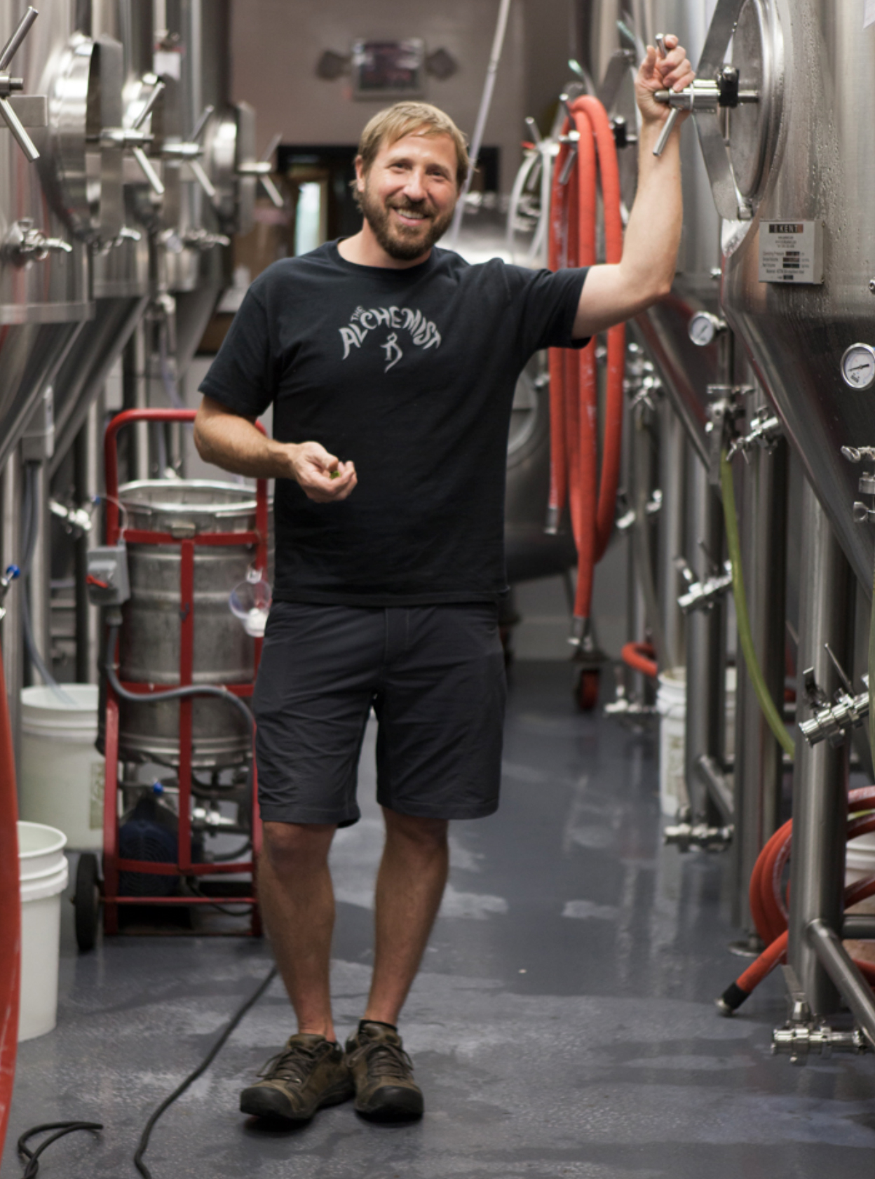 Kimmich in his brewery wearing a black Alchemist t-shirt, photo by Greta Rybus.  Kimmich and his team brew 9,000 barrels of Heady Topper each year. 
