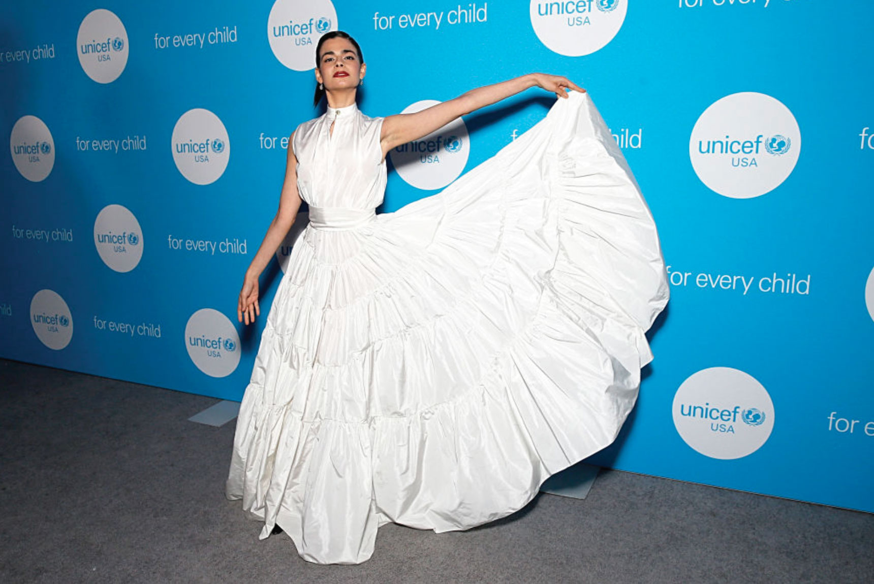 Aria Mia Loberti in white gown at Unicef gala