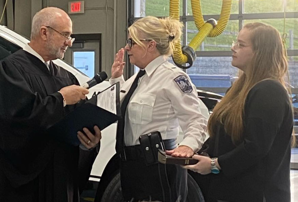 Doyle being sworn in as an officer, courtesy