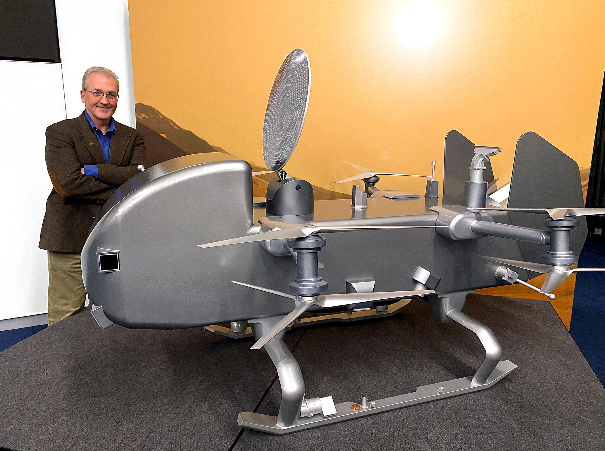 photo of Smith with half-size model of Dragonfly, courtesy