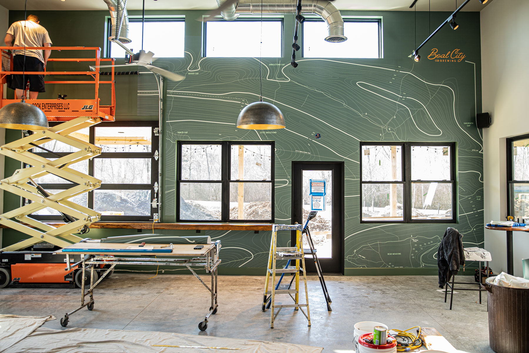 interior of Boal City Brewing Co. as wall is being painted, by Cardoni