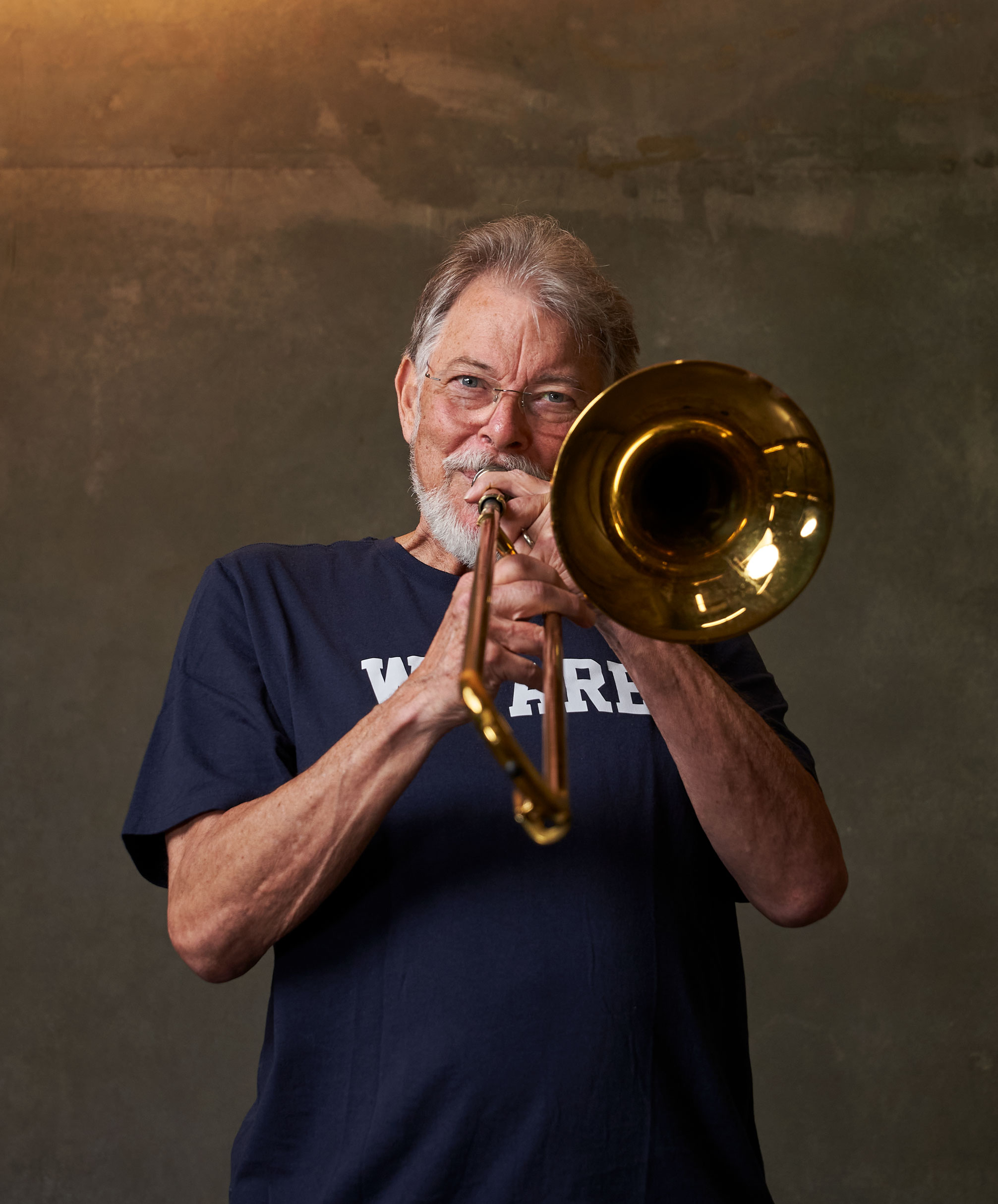 Frakes playing trombone, photo by Gregg Segal