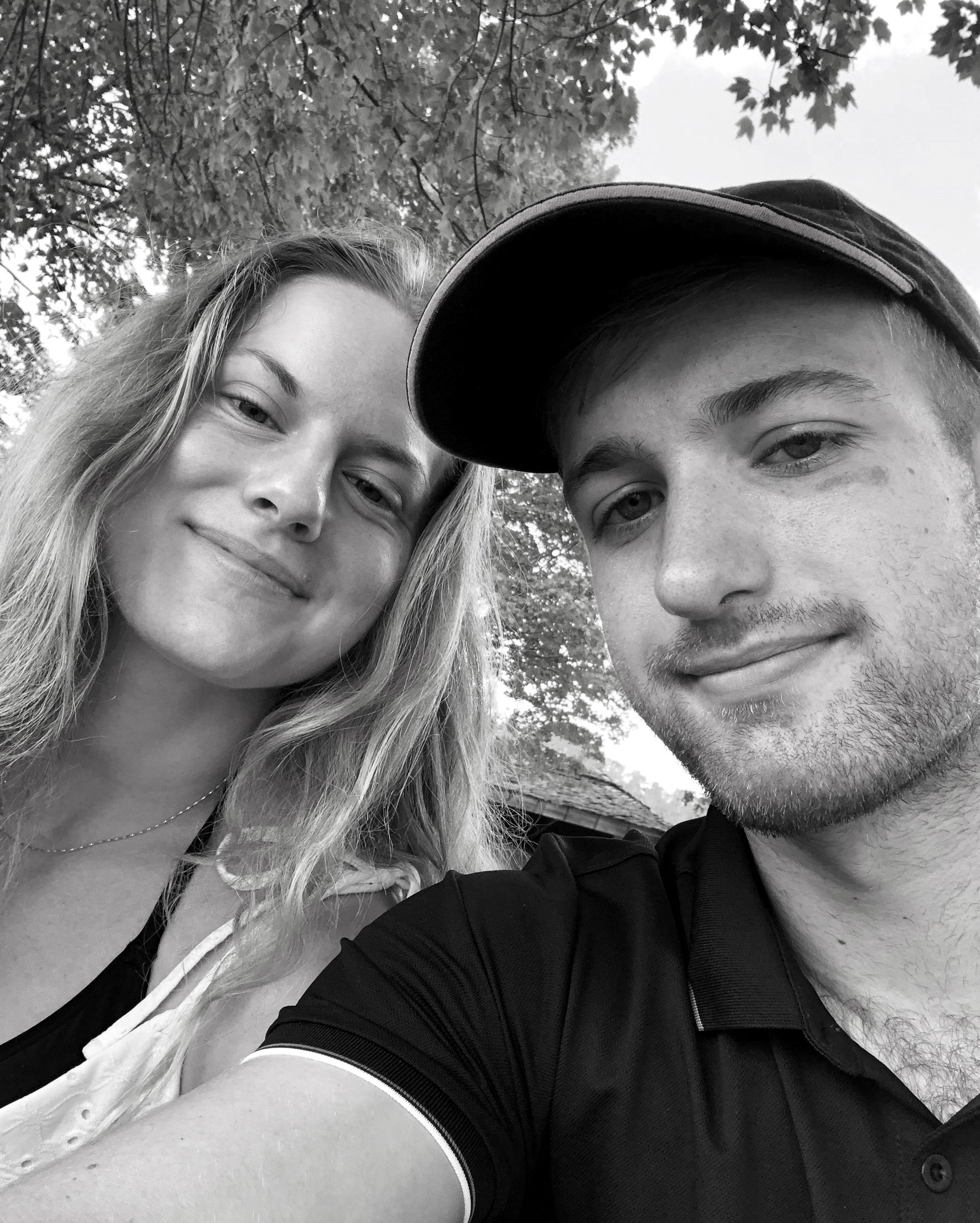 black and white photo of Lovisa and Matthew outside at University Park, courtesy