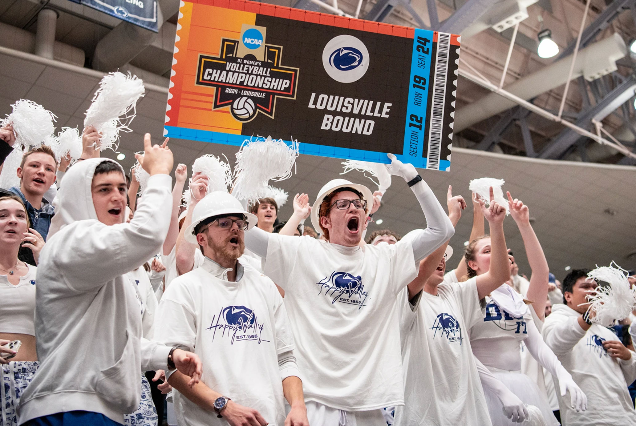 Nittany Lion women's volleyball fans hold up Louisville Bound banner after Big 10 win, photo by Penn State Athletics