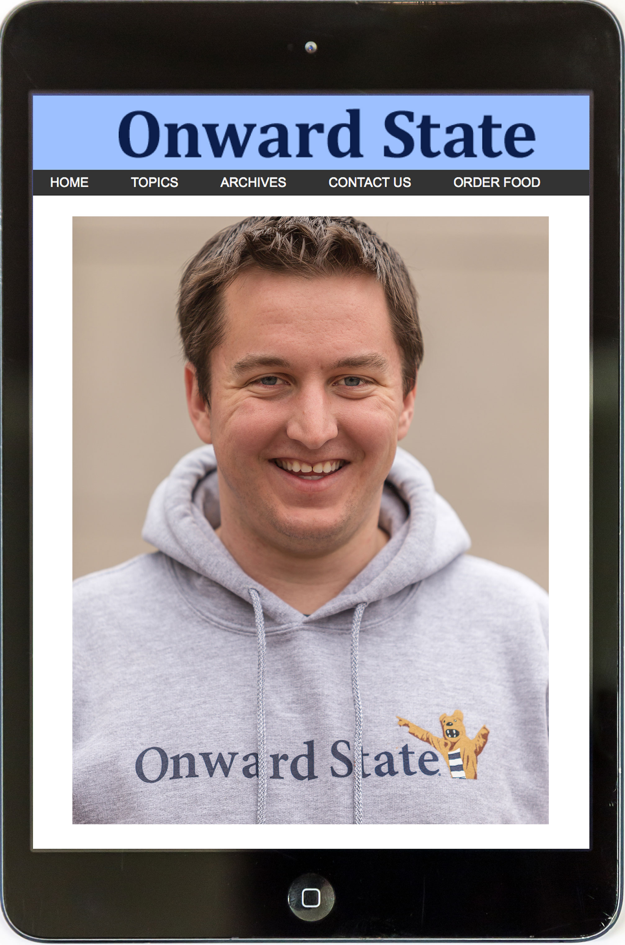 Horne head shot in iPad frame, photo by Nick Sloff '92 A&A