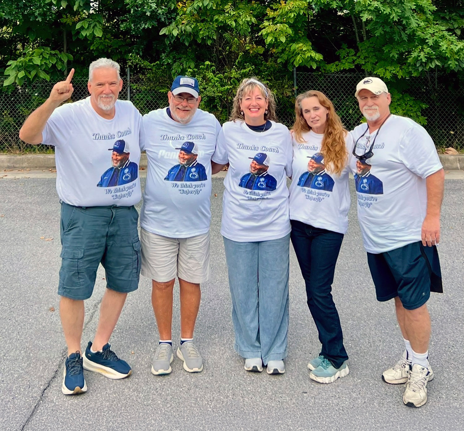 submitted photo by Becker of a family wearing matching white t-shirts supporting Terry Smith