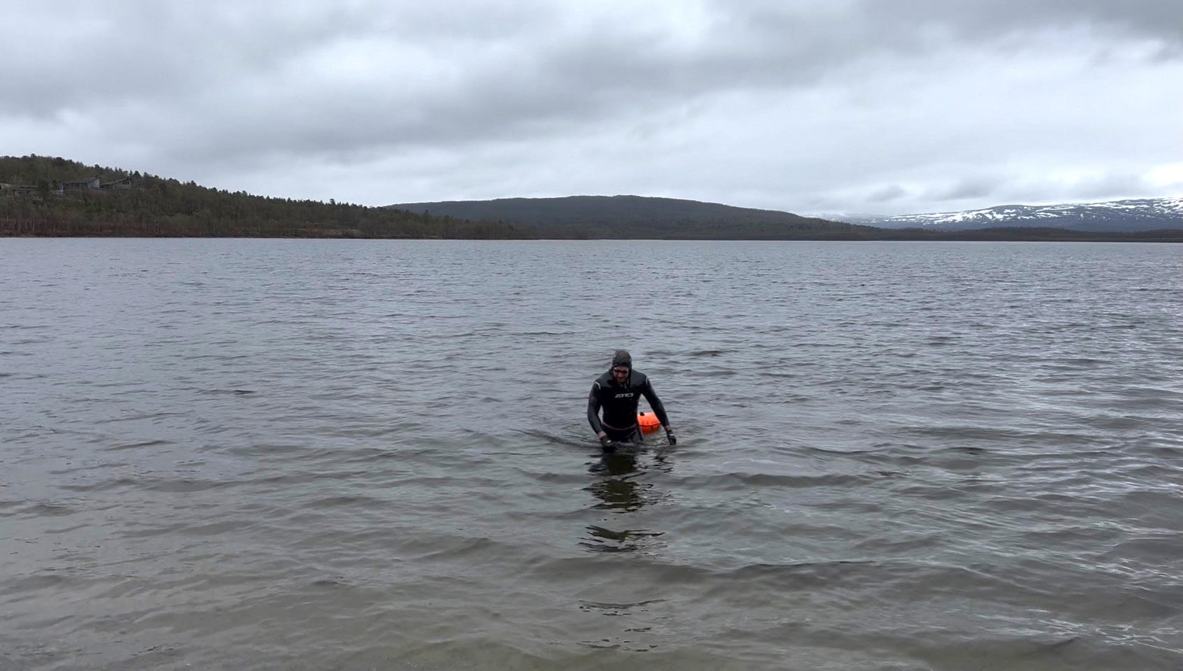 Hollingham emerging from lake, courtesy