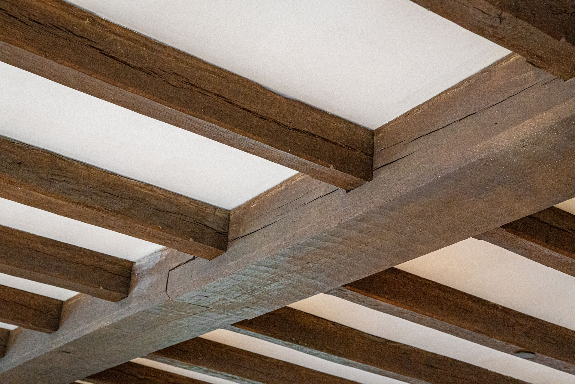 closeup of ceiling crossbeams from the original Nittany Lion Inn, photo by Nick Sloff '92 A&A