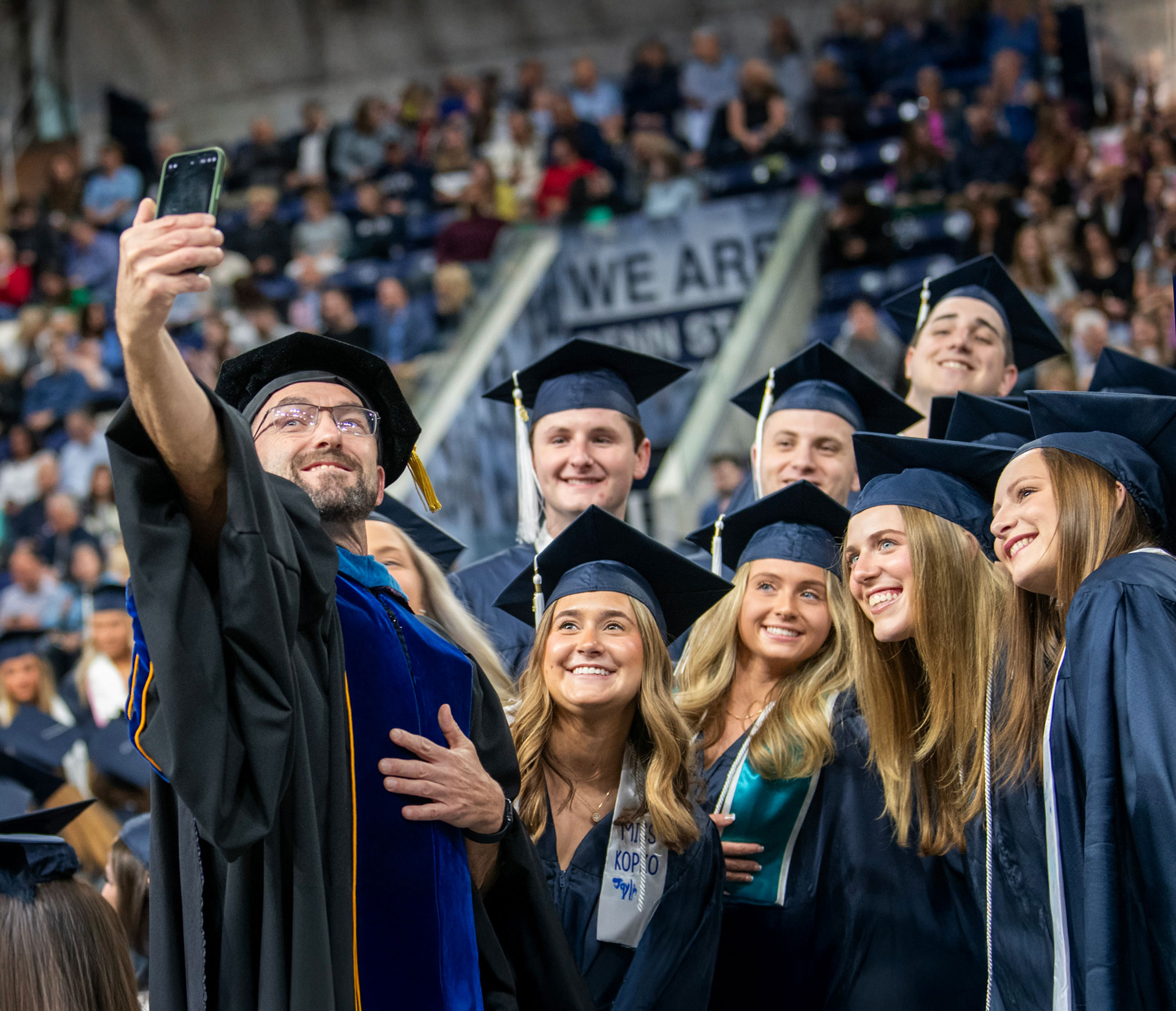 photo of 2024 grads taking a selfie by patrick mansell
