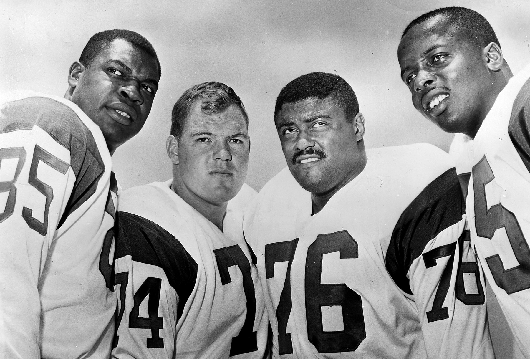 black and white photo of the Fearsome Foursome by AP Photos/NFL Photos