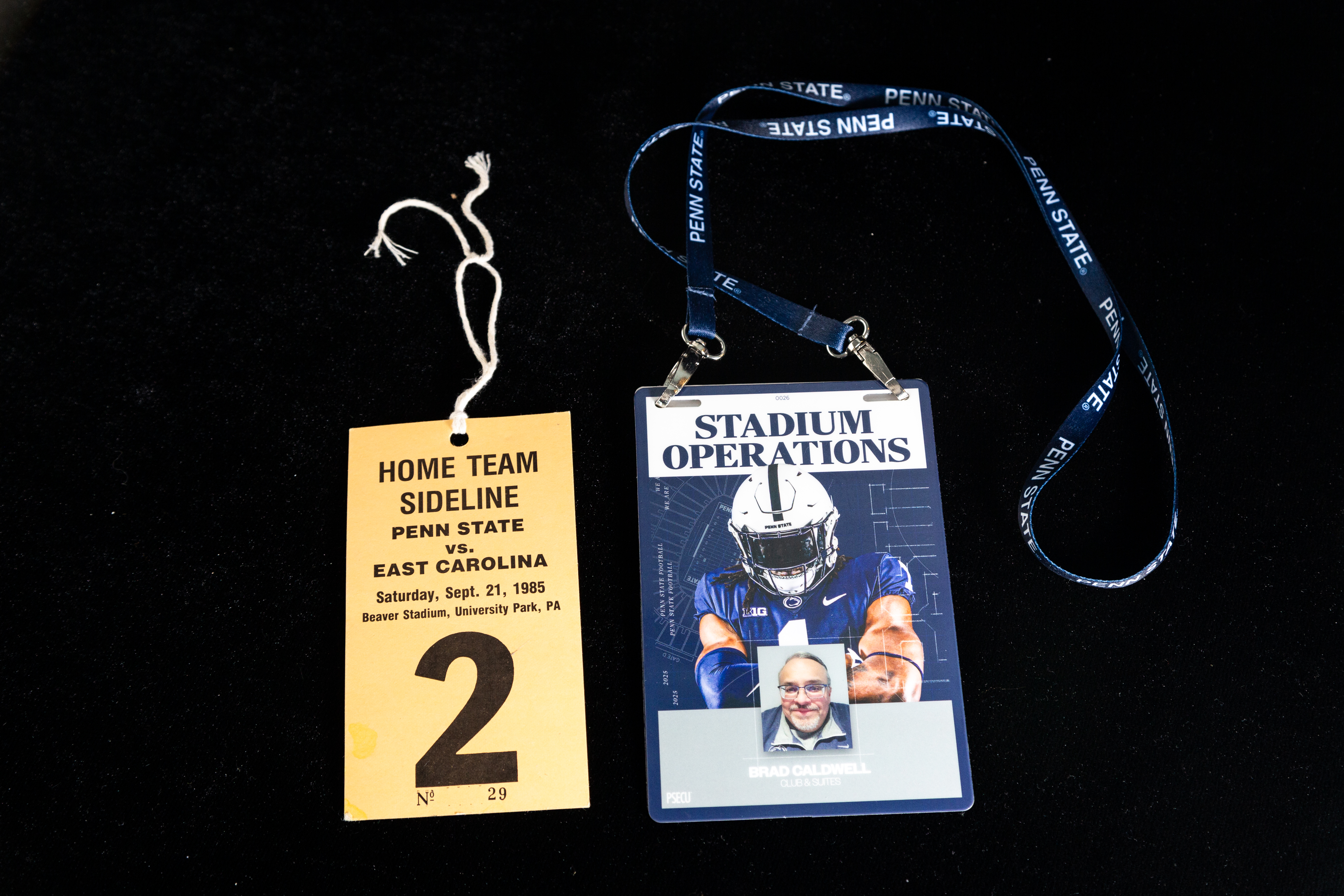 two credential badges on lanyards, photo by Nick Sloff '92 A&A