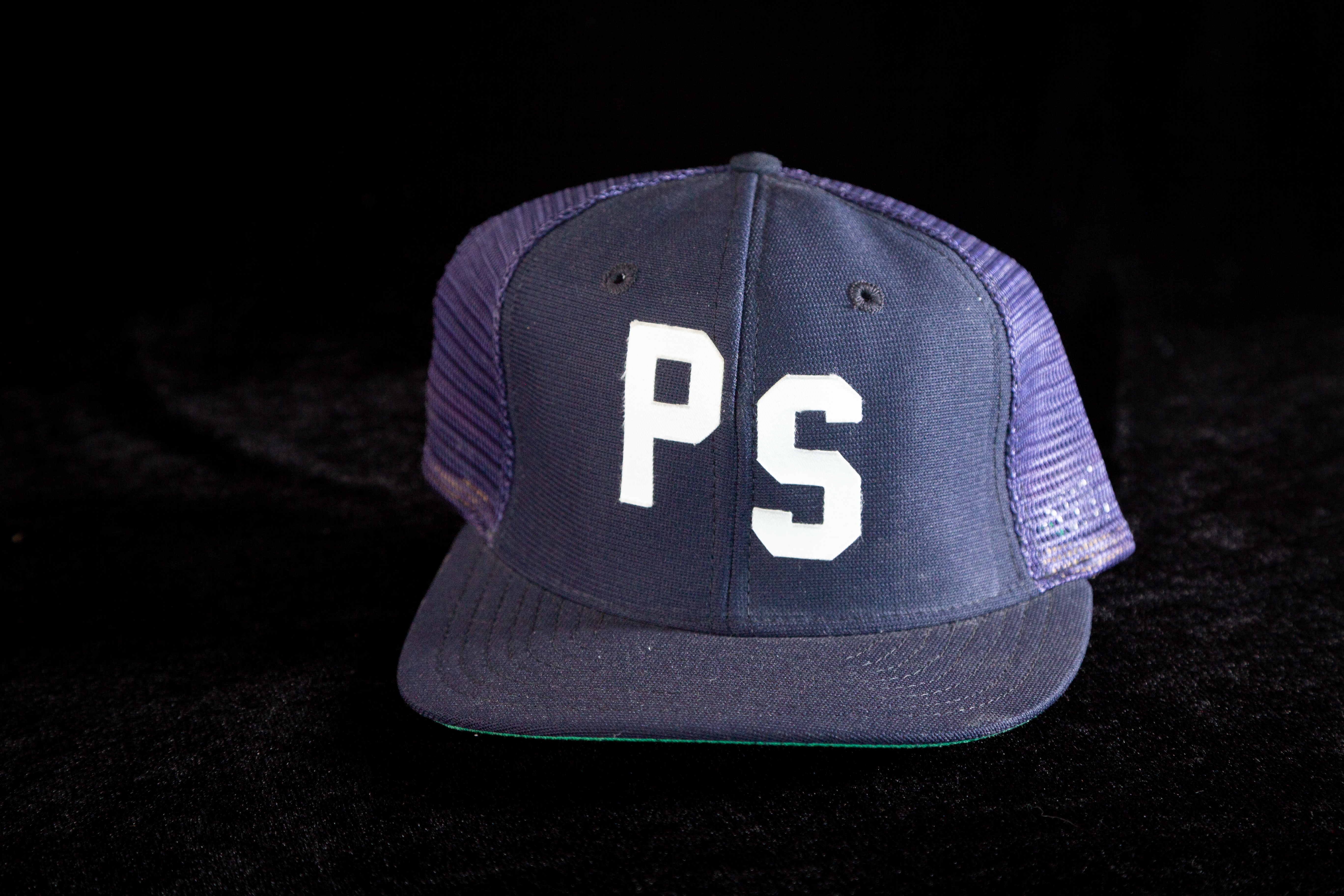 blue PS cap belonging to Caldwell, photo by Nick Sloff '92 A&A