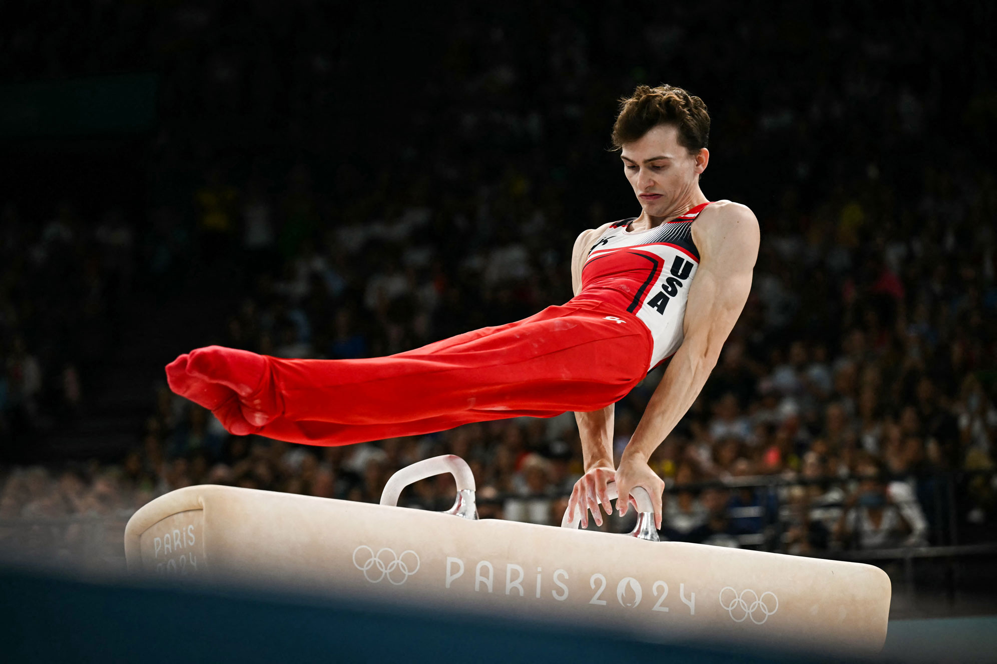 Nedoroscik on pommel horse at the Summer 2024 Olympics, photo by Paul Ellis/Getty Images