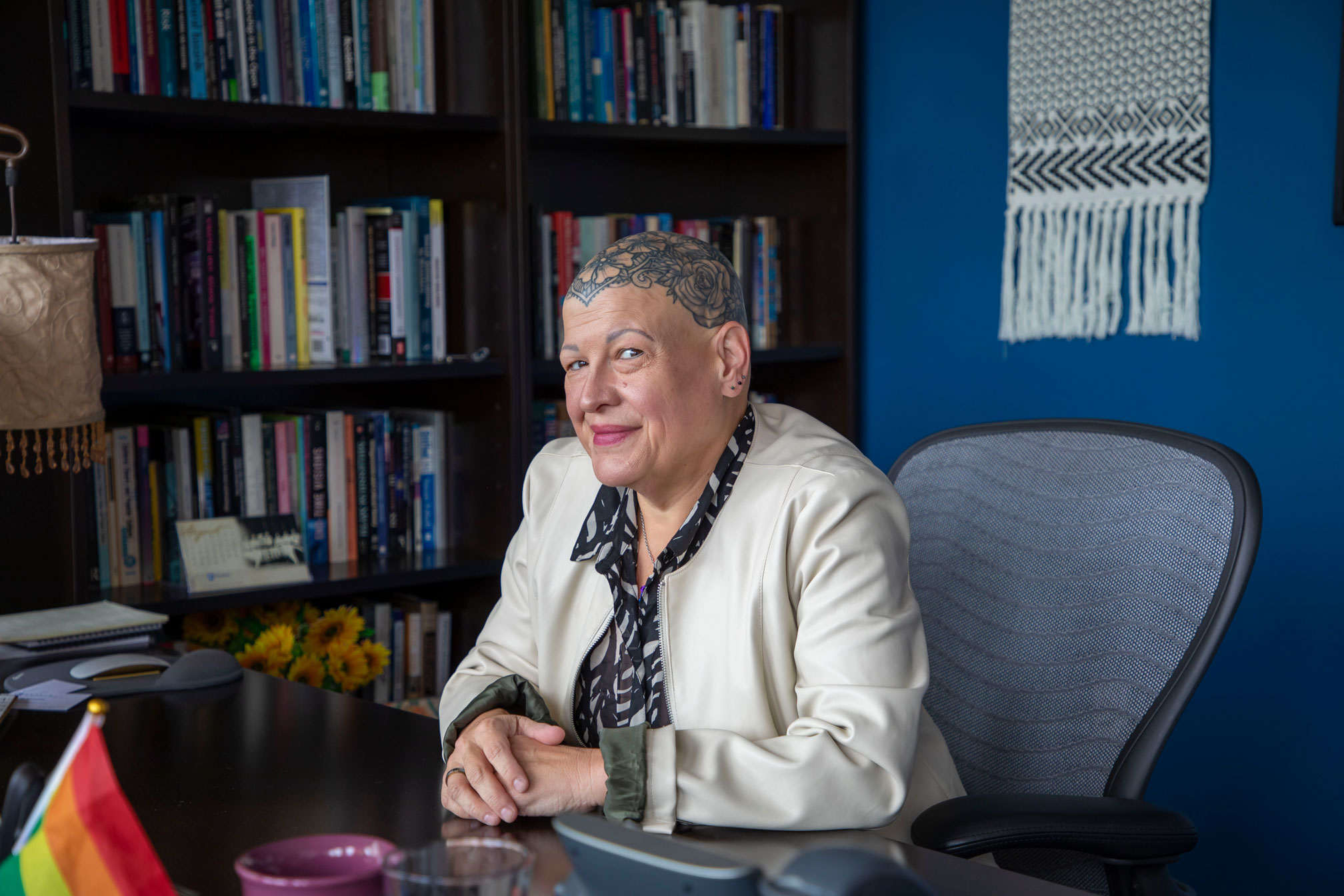 Tapio seated in her office by Jena Soult
