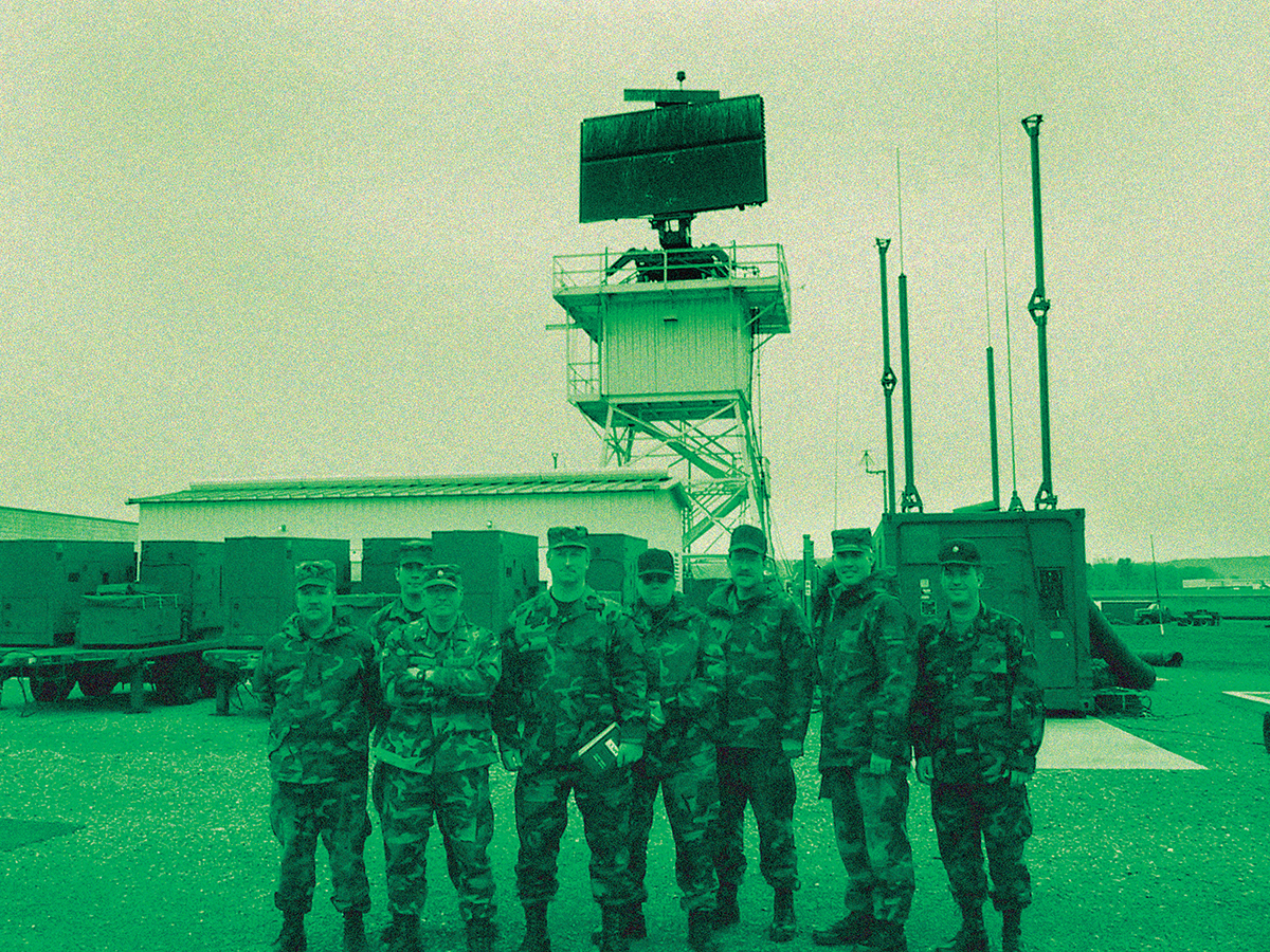 opening photo from The last Mission story featuring green washed group photo of 112th Air Control Squadron, the Air National Guard unit at University Park, courtesy