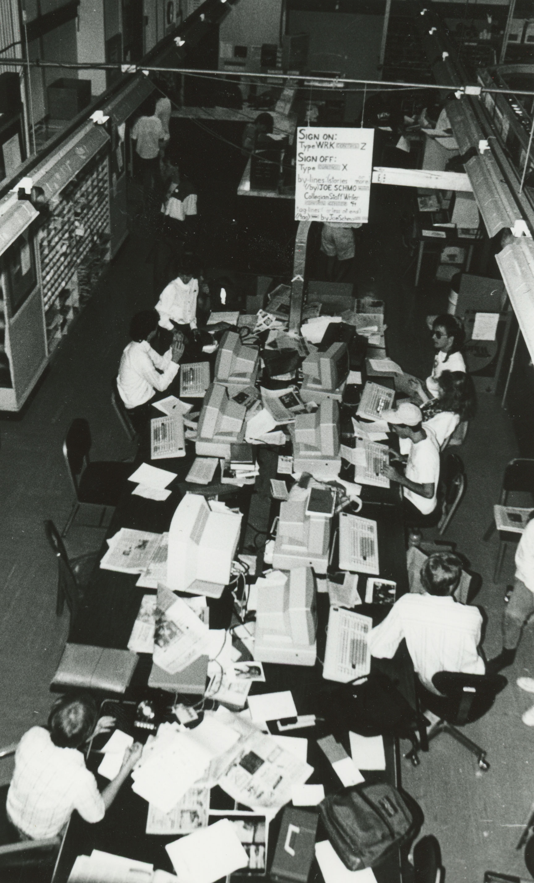 black and white photo of Collegian newsroom, courtesy Collegian