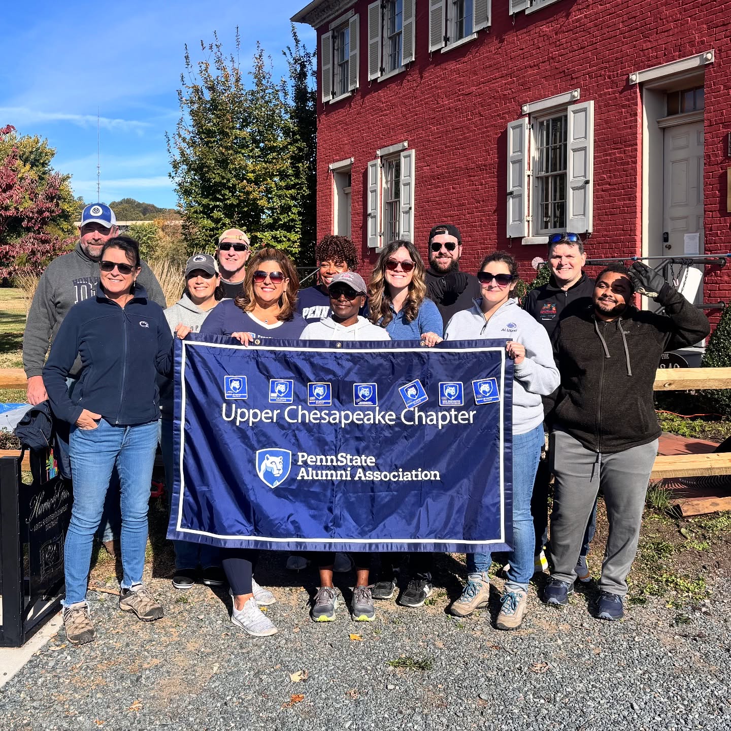 photo of members of the Upper Chesapeake chapter holding their banner, courtesy