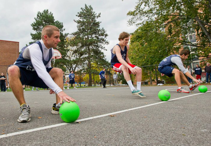 Eli Glazier playing dodgeball outside, photo courtesy