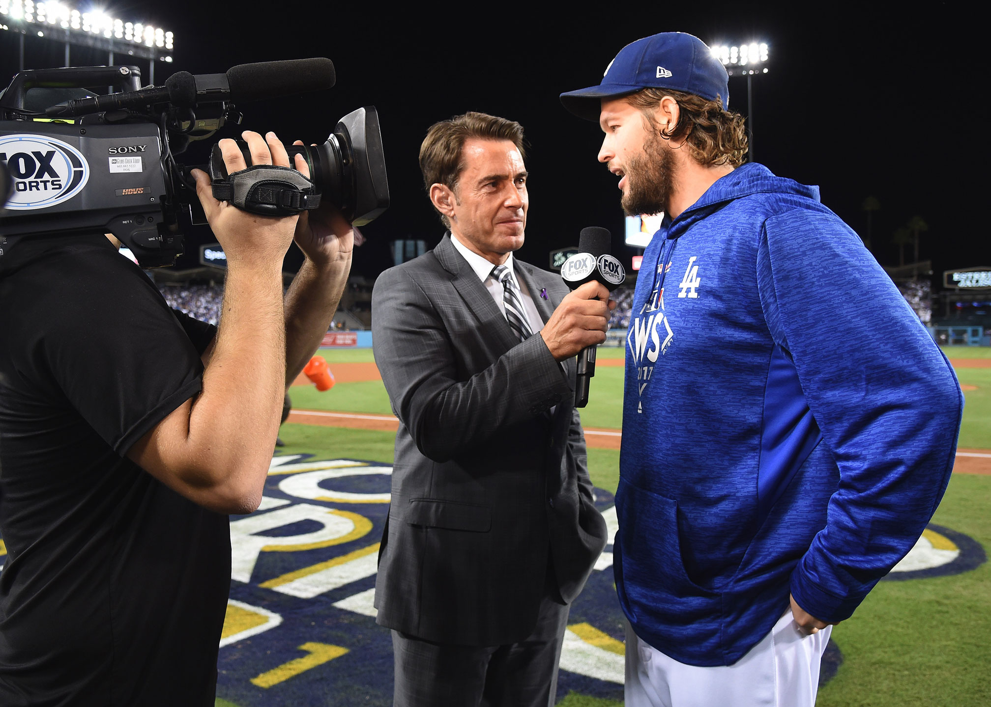 Verducci interviewing a Dodger on the sidelines by Fox Media LLC