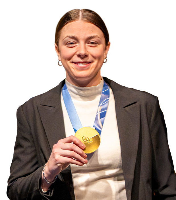 Janecke wearing her Olympic gold medal, photo by Bryce Mosemen/Penn State Athletics