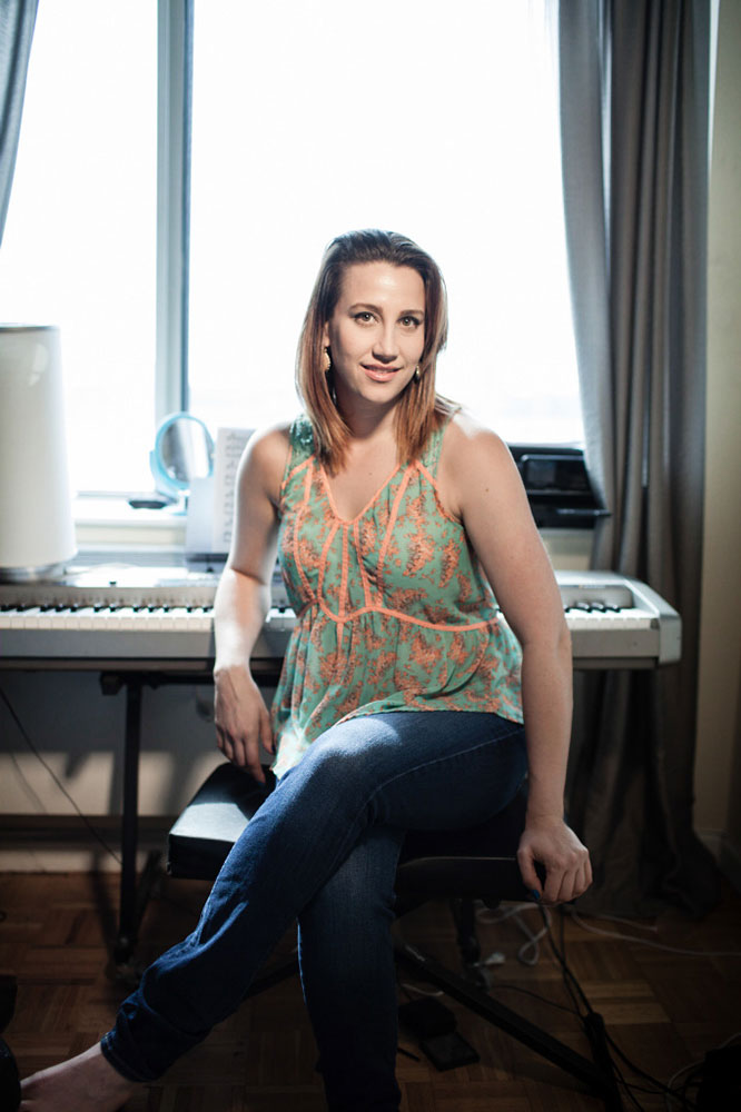 Natalie Weiss sitting before her keyboard, photo by Cardoni
