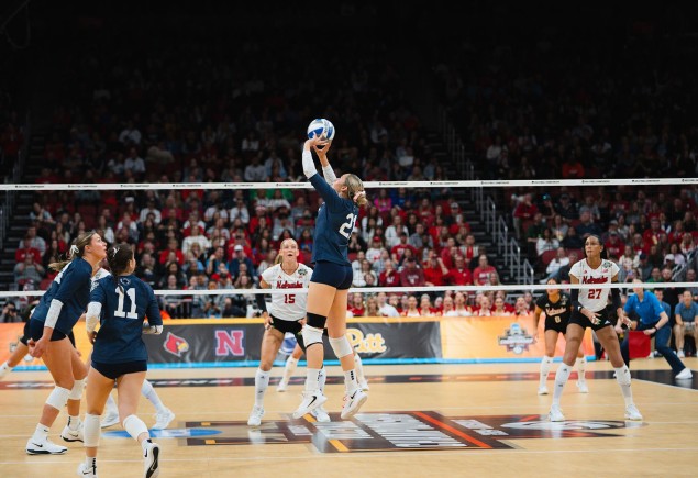 Nittany Lion women's volleyball team on the court, photo by Penn State Athletics