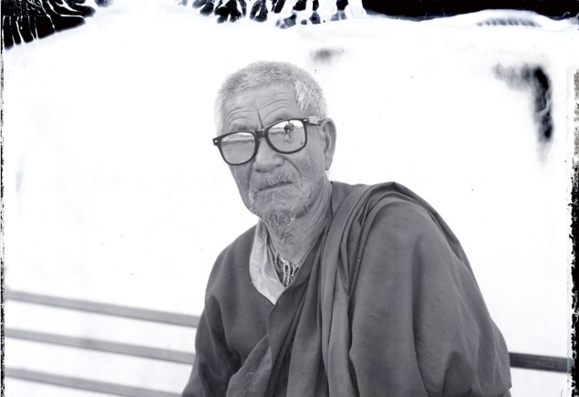 Lonnie Graham's black and white portrait of a Buddhist pilgrim in Zanskar, India