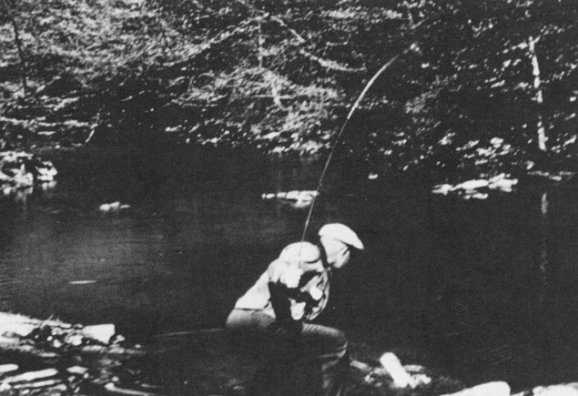 black and white photo of Eisenhower fishing