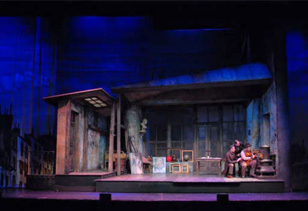 photo of a stage during a performance, courtesy