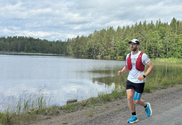 photo of Hollingham jogging beside a lake, courtesy