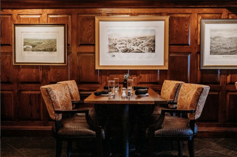 interior photo of a booth at the Tavern restaurant, courtesy