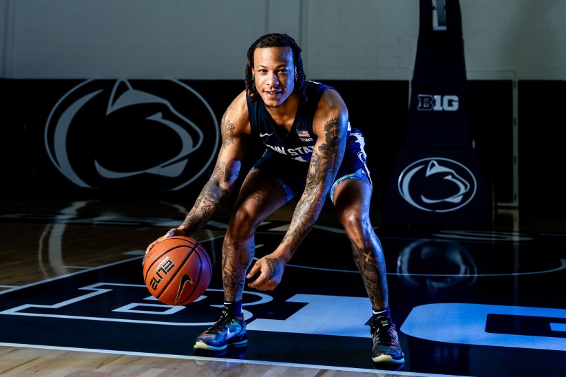 photo of Ace Baldwin dribbling basketball by Cardoni