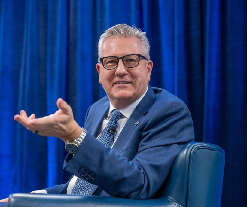 photo of seated Matt Schuyler gesturing with left arm, by Penn State