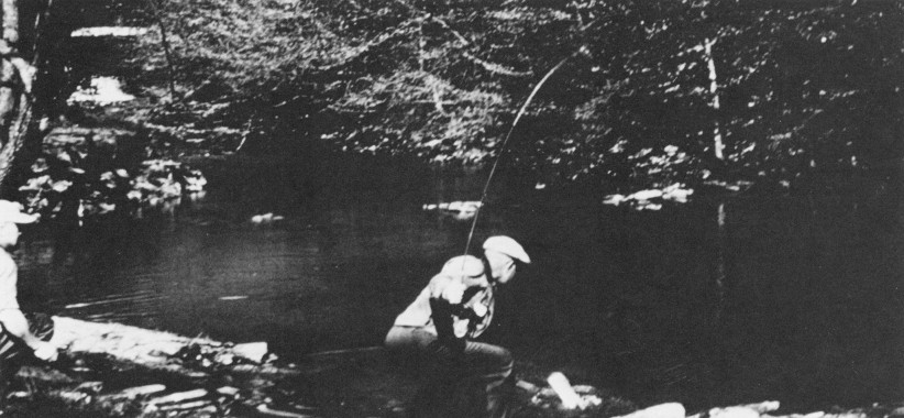 black and white photo of Eisenhower fishing