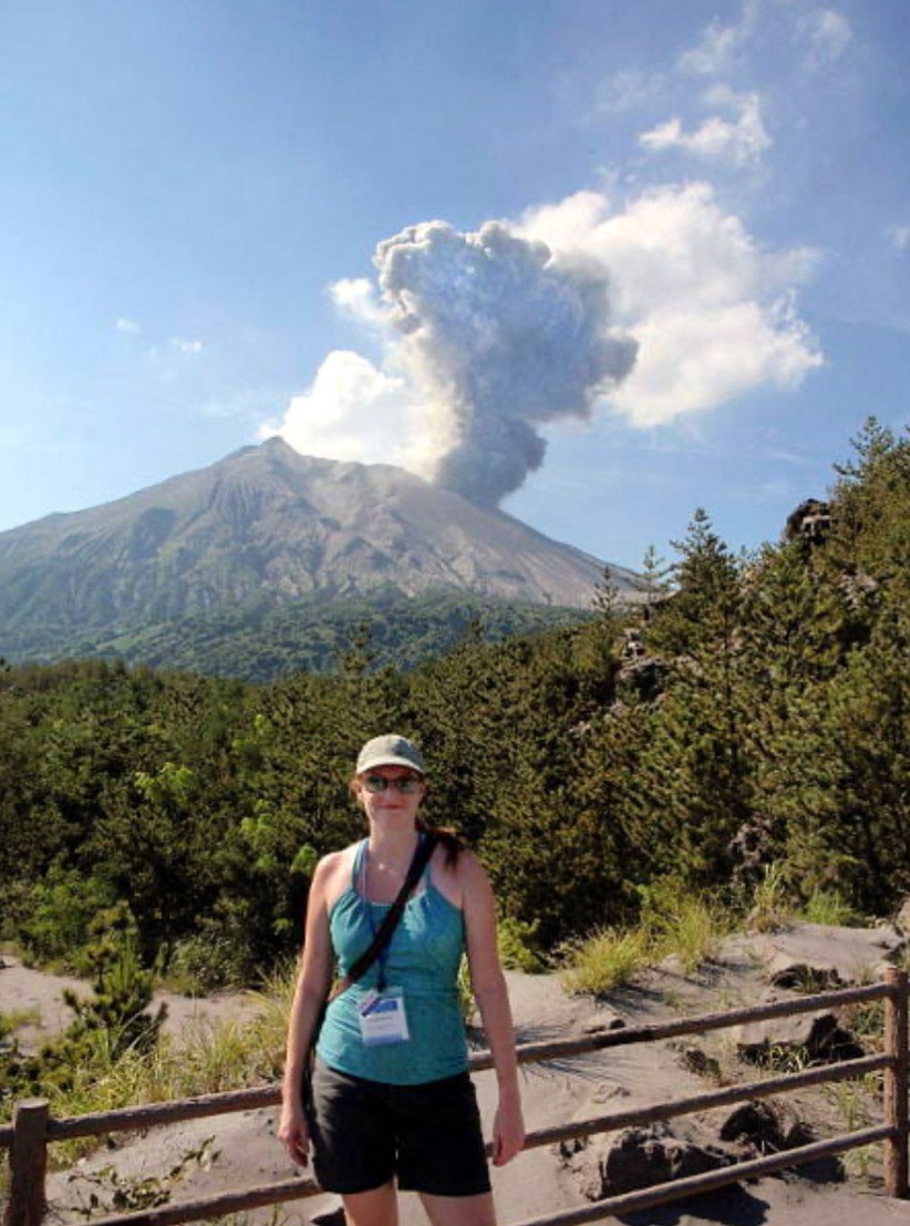 Wauthier in foreground of an active volcano, courtesy