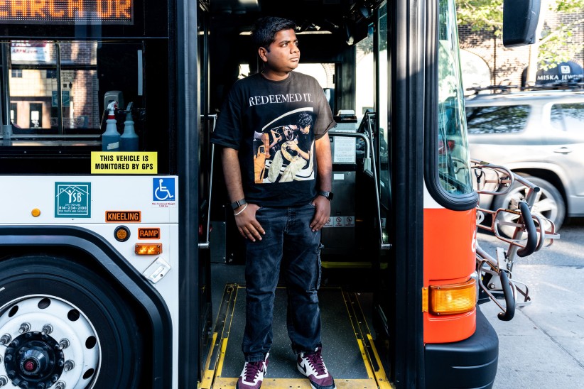 photo of Shamak Agarwal standing on bus steps by Cardoni