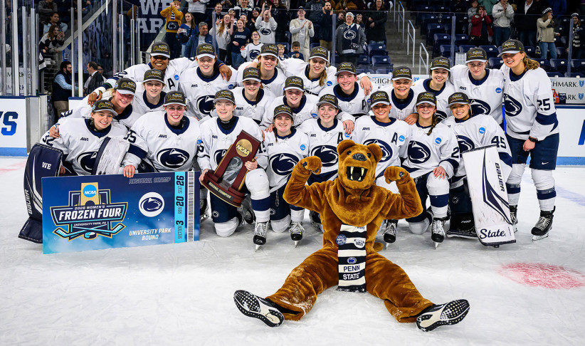 women's hockey team with the Nittany Lion and their trophy, photo by Mark Selders/Penn State Athletics