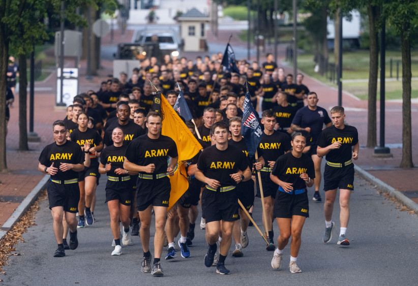 photo of a Penn State Army ROTC battalion running at University Park, photo by Michael Owen
